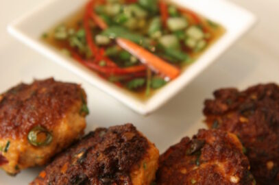 "Golden-brown Thai fish cakes served with a refreshing cucumber relish