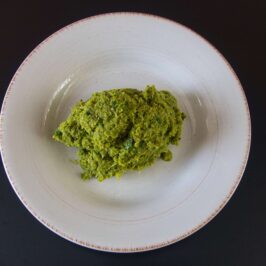 A vibrant, freshly ground Thai green curry paste, ready to be used in your favorite Thai dishes