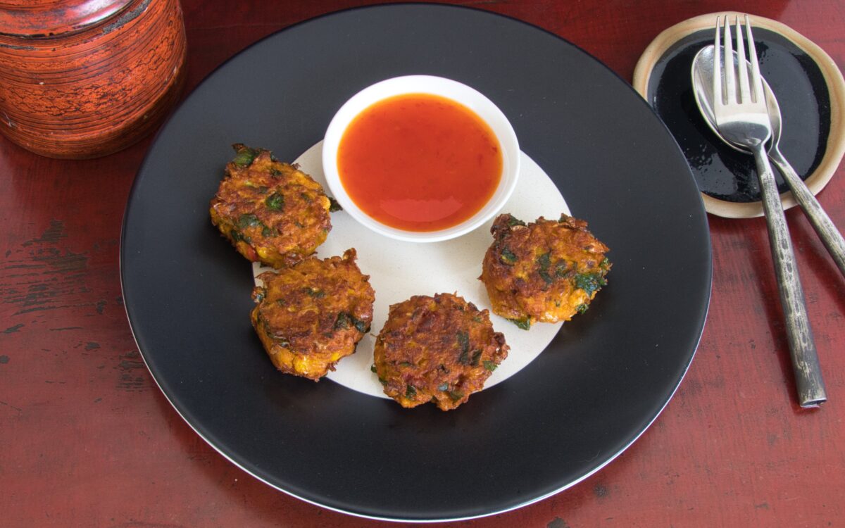 “Gluten-free Thai corn fritters with sweet chilli sauce — a simple, delicious snack.”
